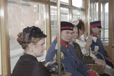 People in a historic tram