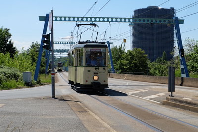 Railcar 888 on the public transport route, the gasometer in the background
