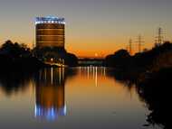 Oberhausen gasometer brightly colored at night