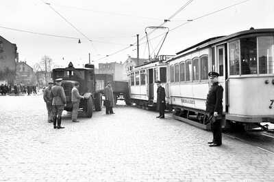 People in front of STOAG vehicles